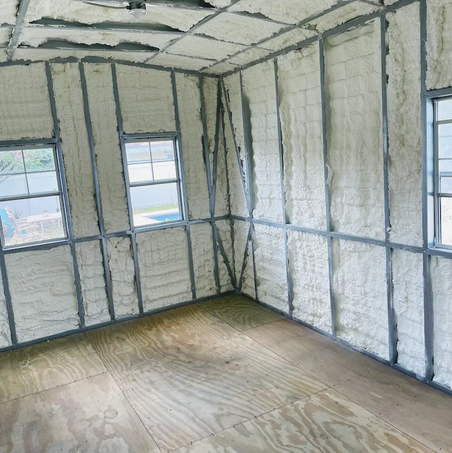 Closed-cell spray foam insulation applied to wall cavities in a residential project in Wakefield